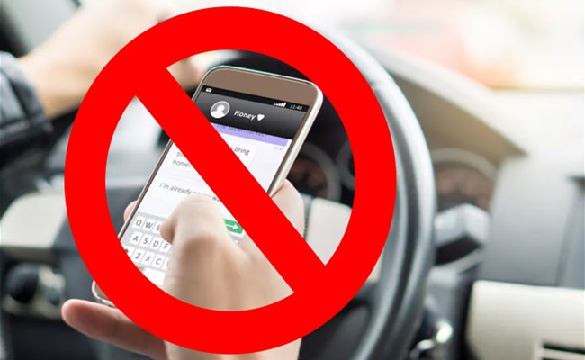 Never Use A Hand Held Mobile Phone While Driving... Know More