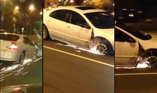 بالفيديو : امرأة تقود سيارتها رغم فقدها العجلة الأمامية اليمني